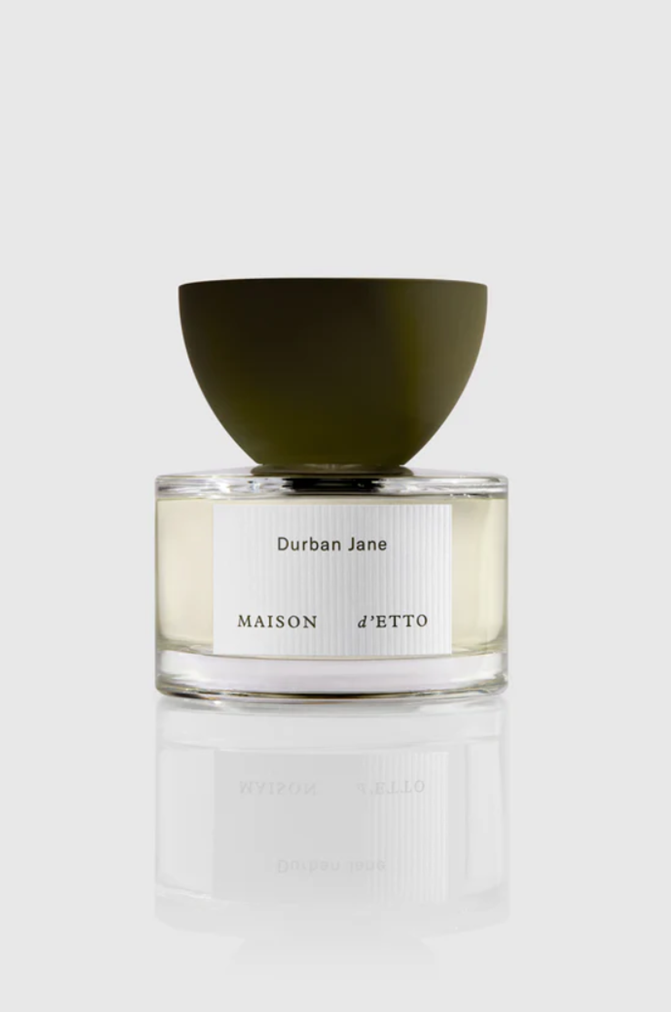Perfume bottle labeled 'Durban Jane' by 'Maison d'Etto' on a white background