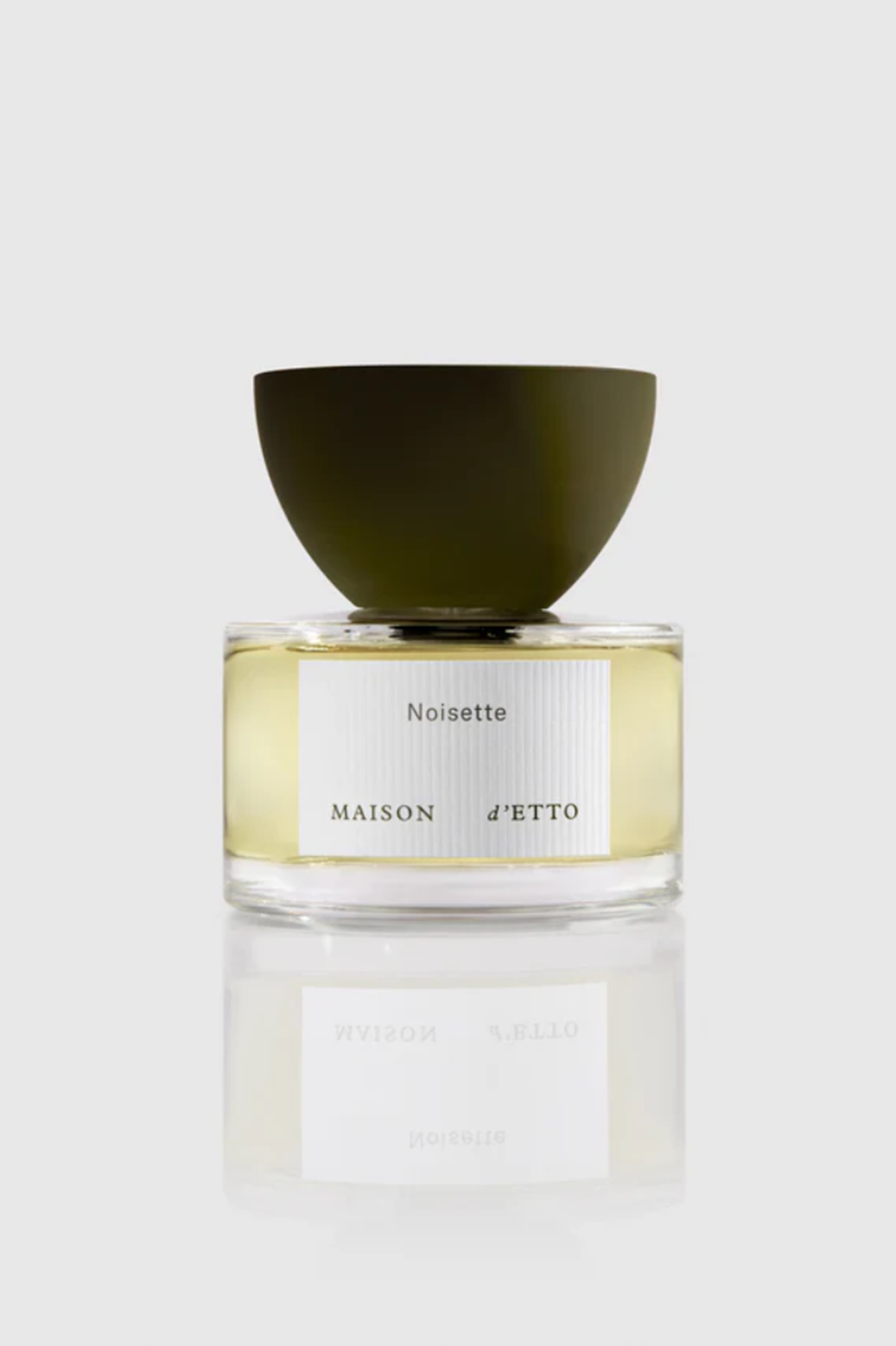 Perfume bottle labeled 'Noisette' by 'Maison d'Etto' on a white background
