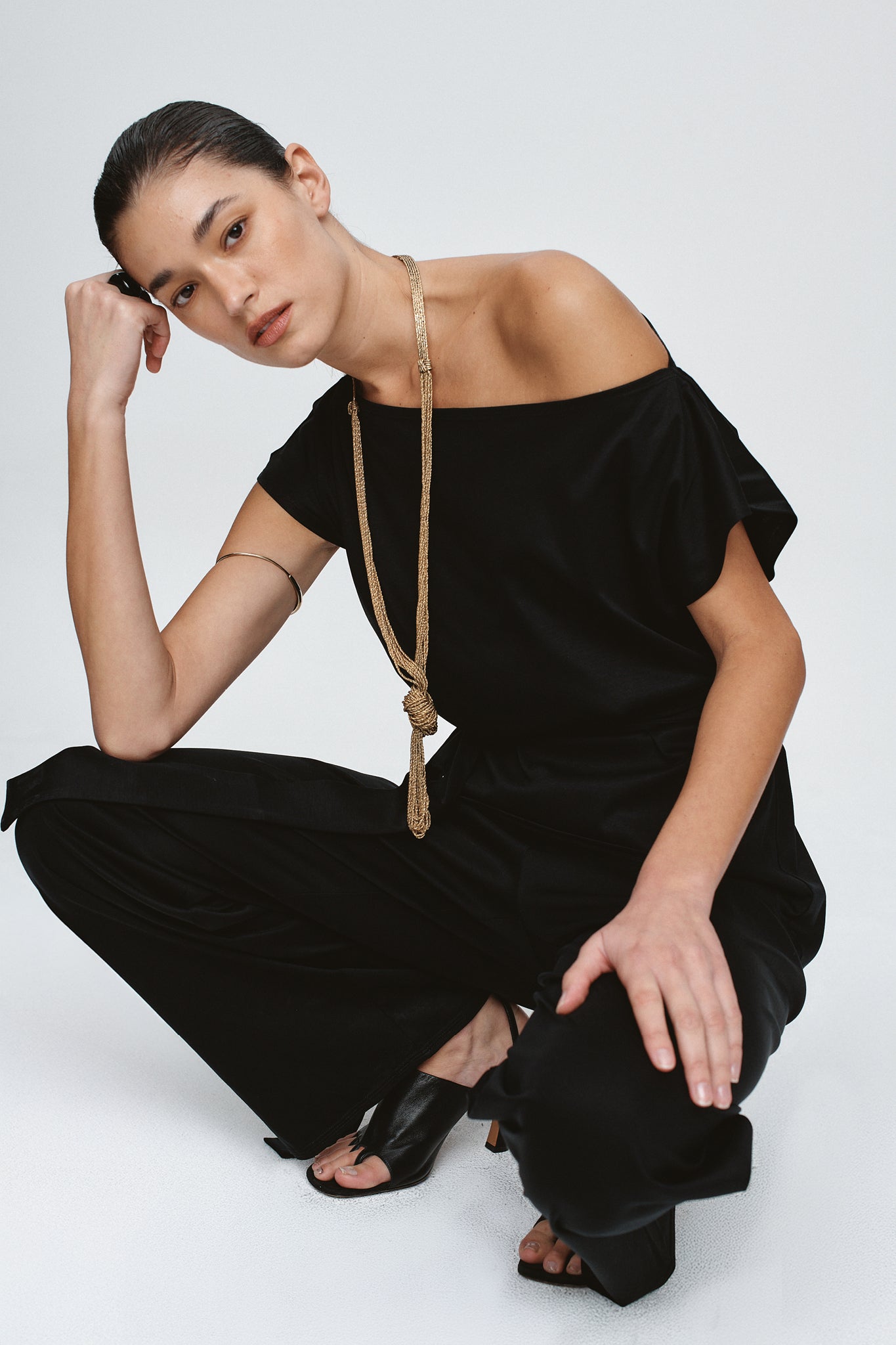image of a model wearing the marle fay top in black
