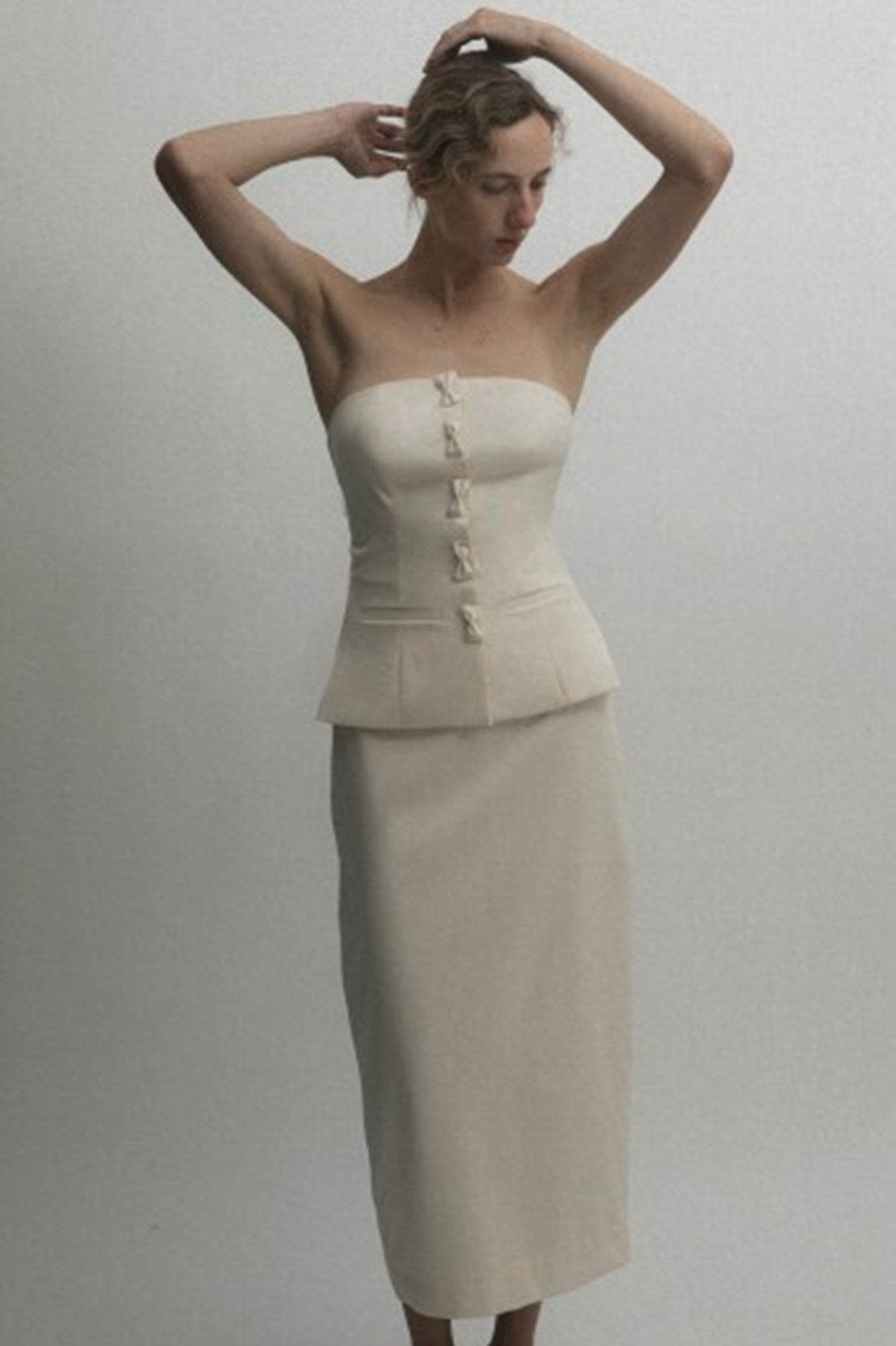 image of a model wearing the Marlies Grace Olivia Top and Skirt