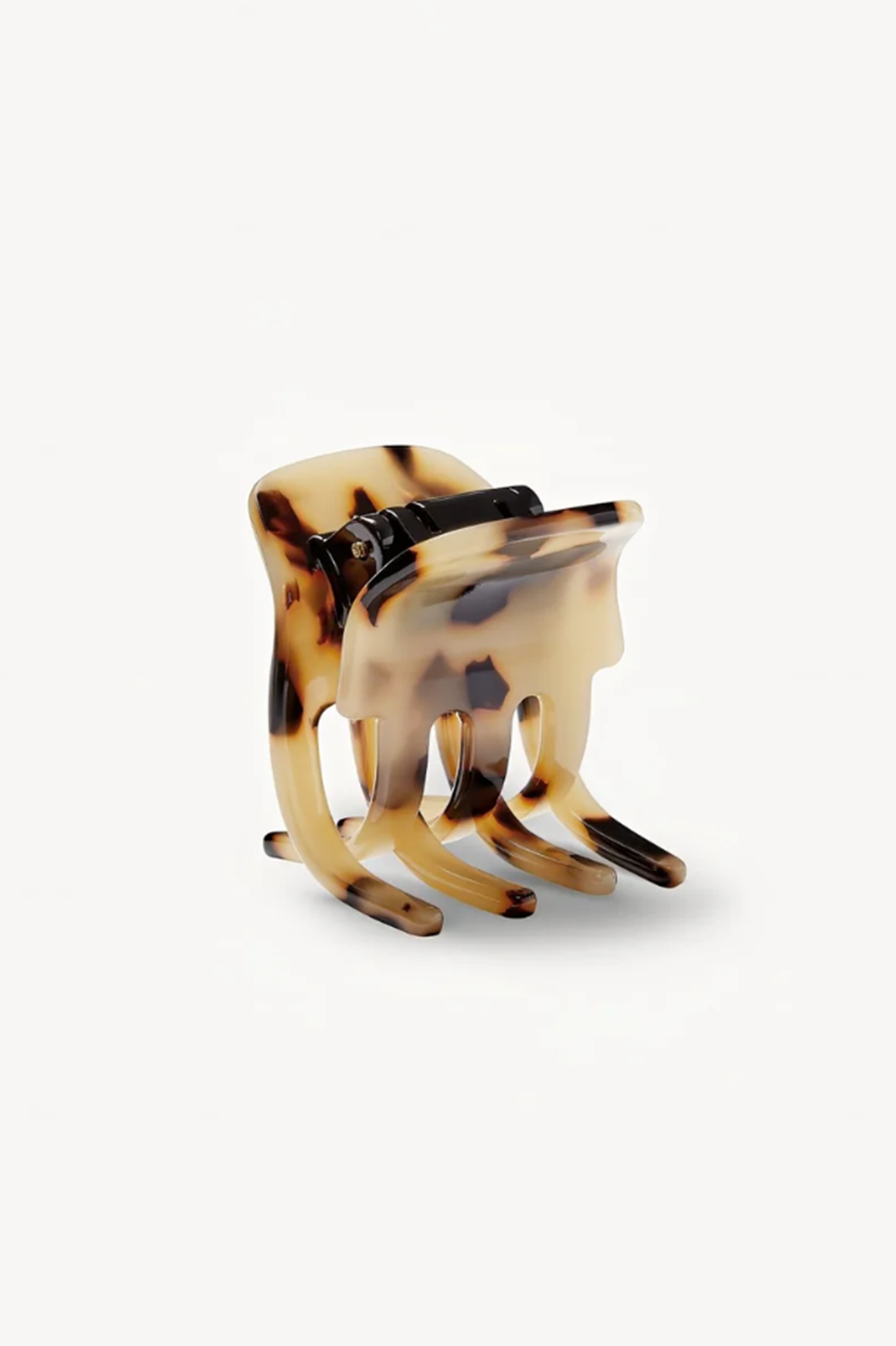 Blonde Tortoiseshell hair clip or claw on a white background