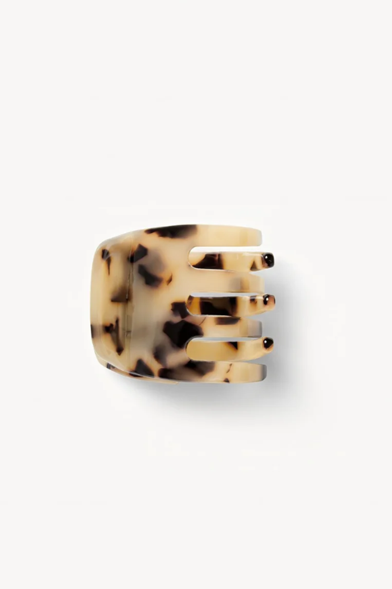 Blonde Tortoiseshell haor clip or claw  on a white background