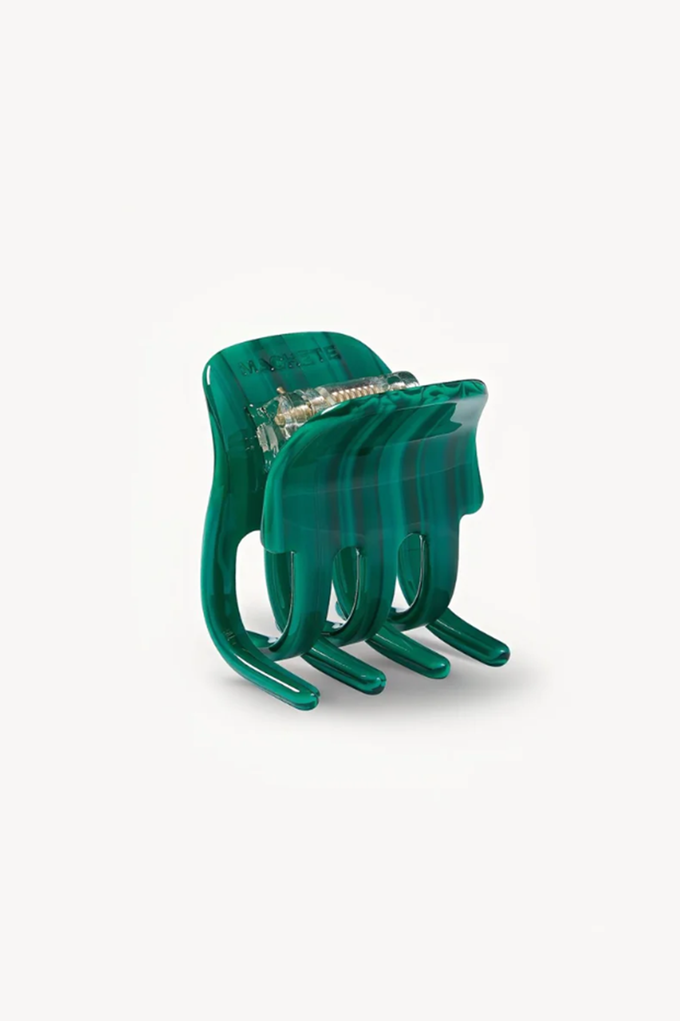 Malachite or Green hair clip or clae on a white background