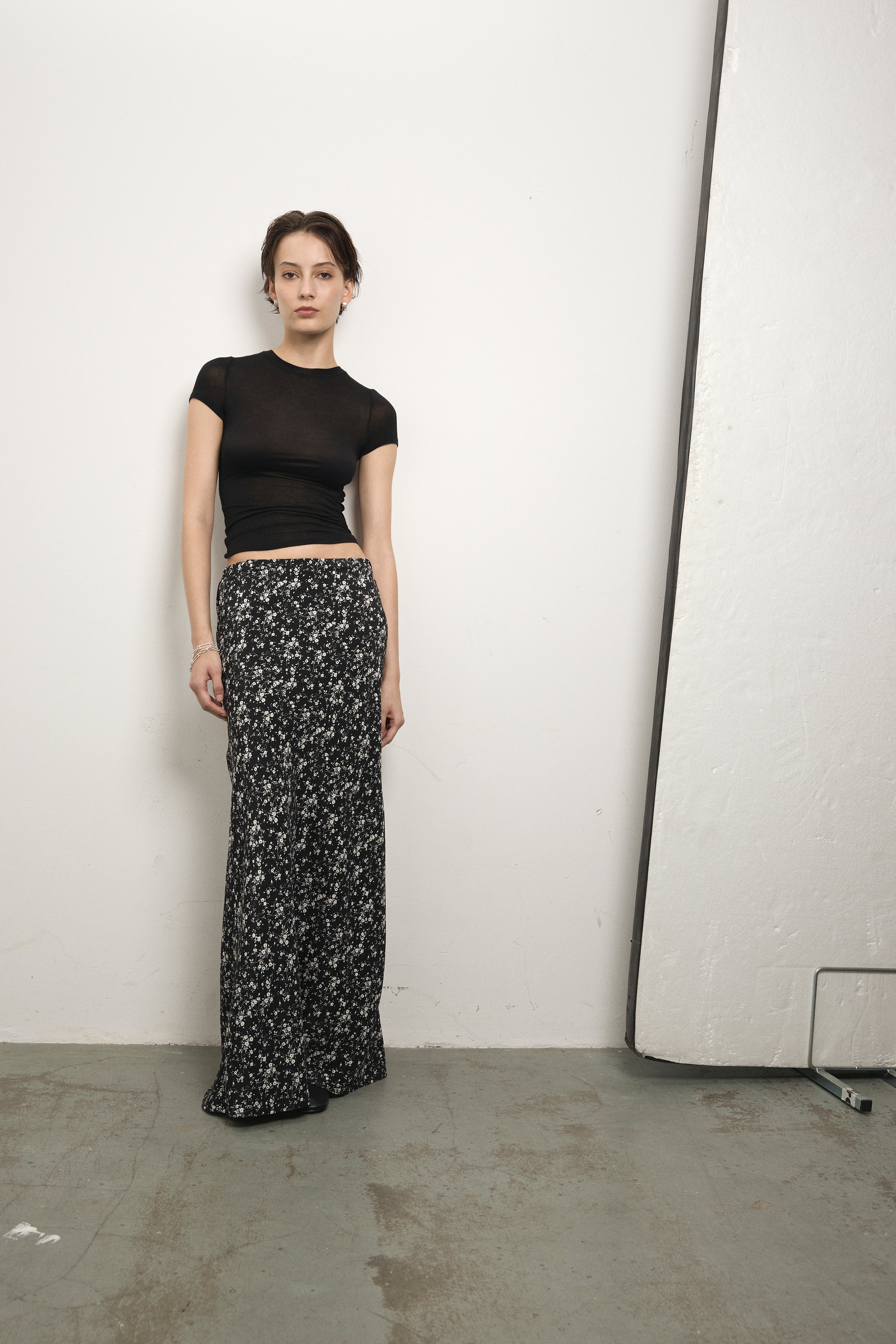 image of a model wearing the Paris Georgia Bias Half Zip Skirt