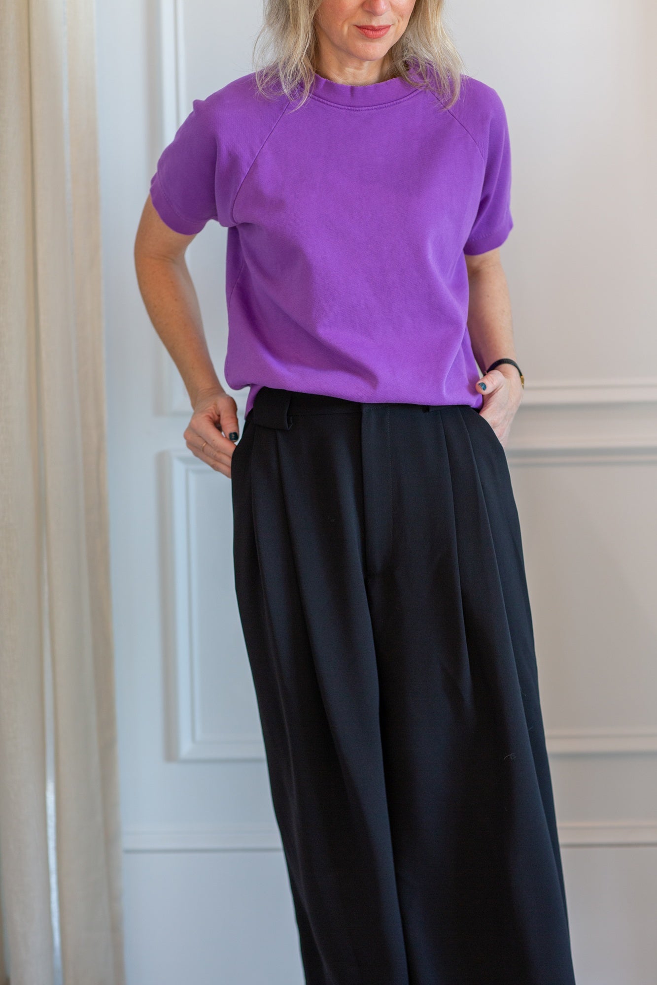 model wearing the rachel comey billi sweatshirt and wolcott pants