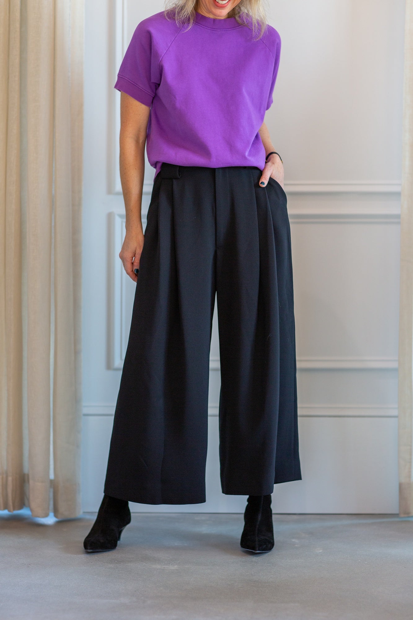 model wearing the rachel comey billi sweatshirt and wolcott pants
