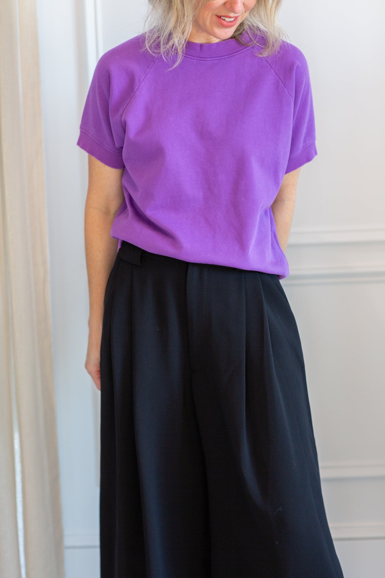 model wearing the rachel comey billi sweatshirt and wolcott pants