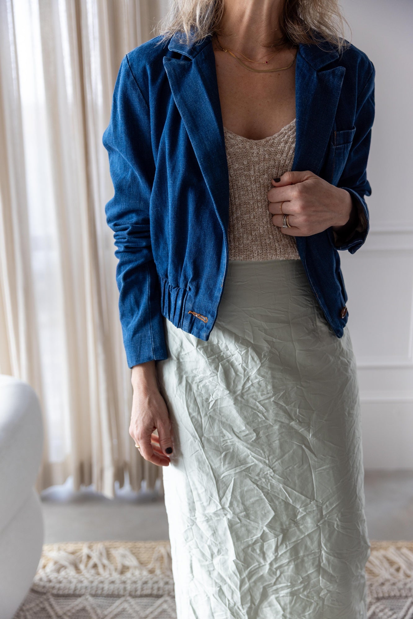 image of a woman wearing the Amo Romy Knit Tank and Rachel Comey Vick Skirt and Grain Jacket