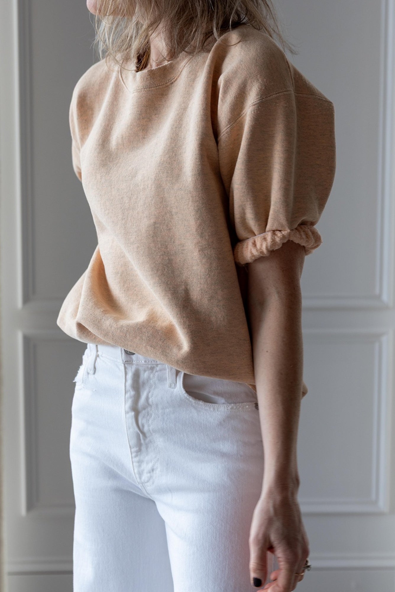image of a woman wearing the Rachel Comey Stanza Sweatshirt and Amo Frida Jeans
