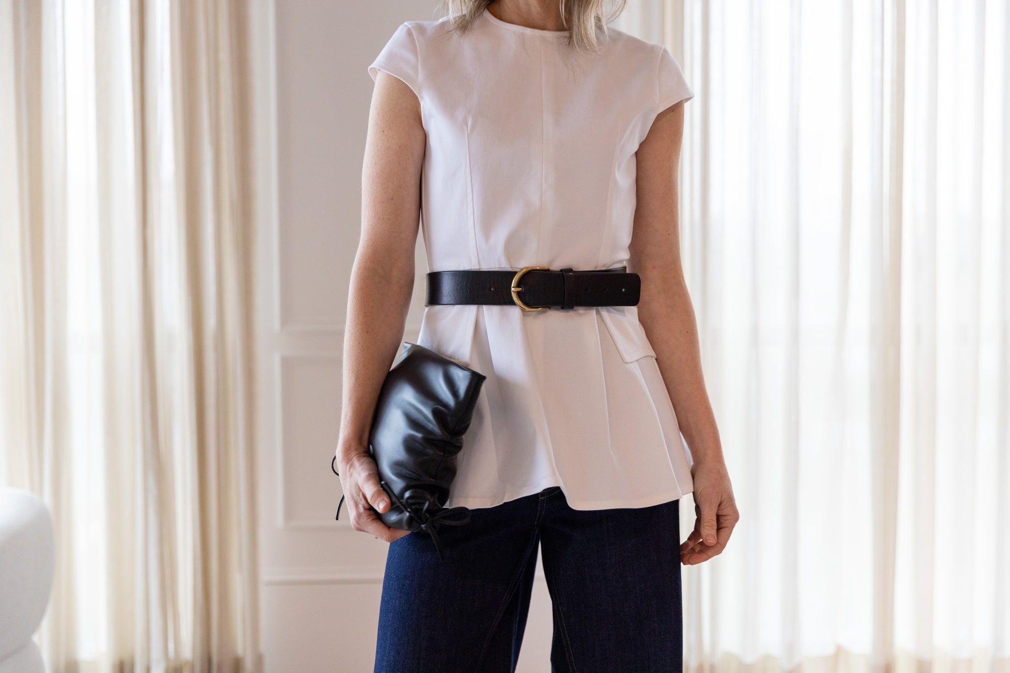 image of a woman wearing the Rhune Ida Top