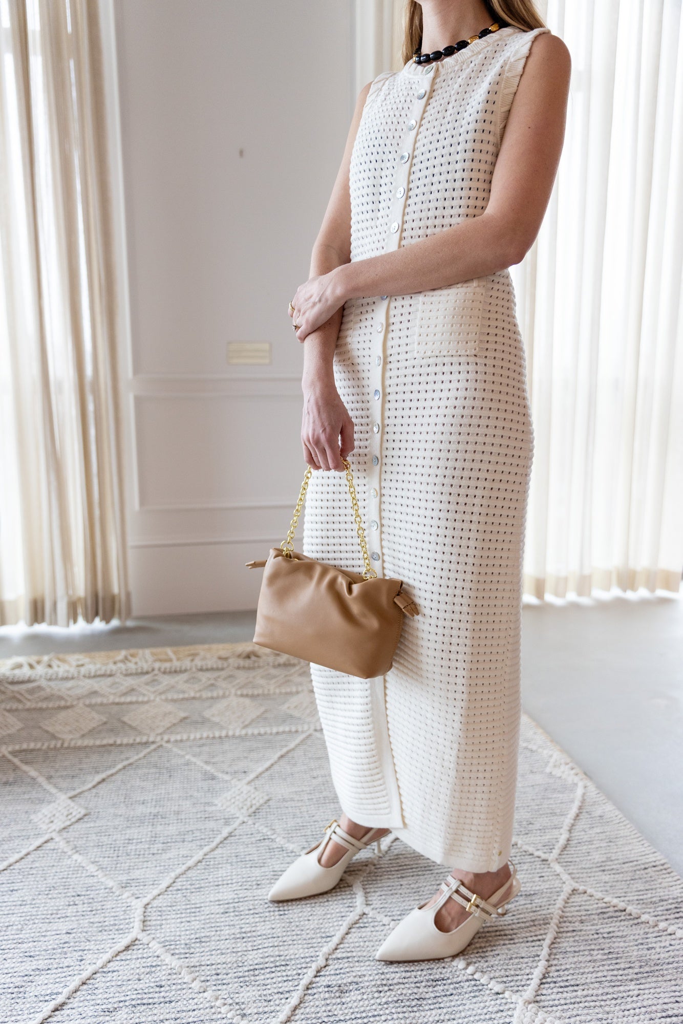 image of a woman wearing the Sancia Kamila Knit Dress