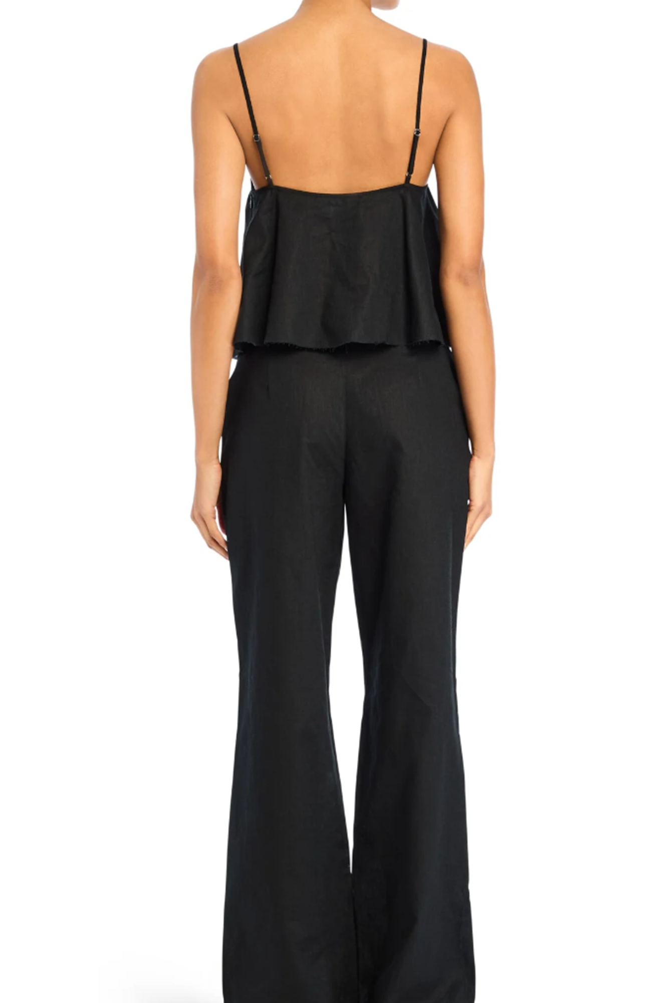 Black sleeveless top and wide-leg pants on a white background