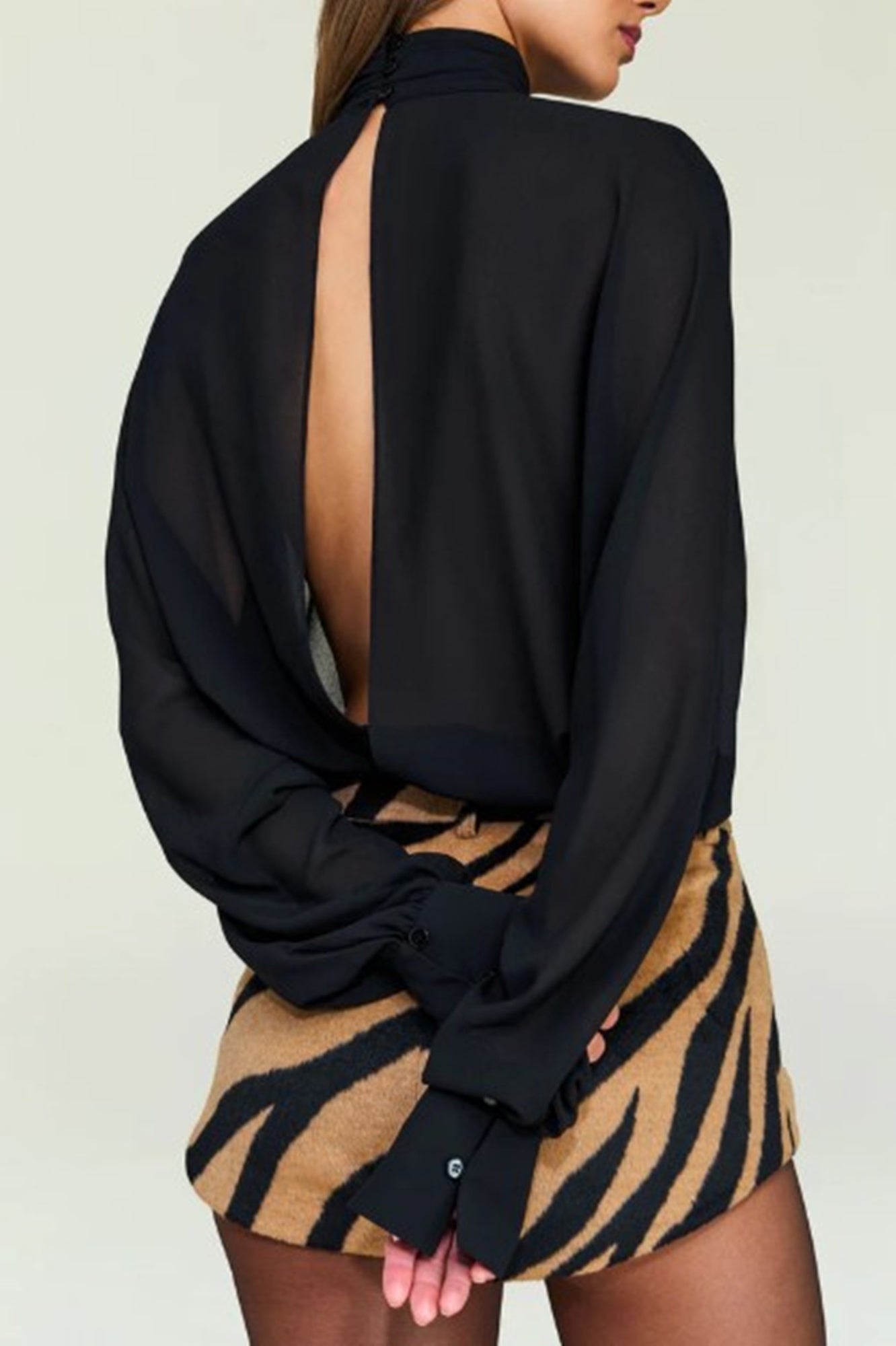 back image of a model wearing the Seroya Farran Blouse