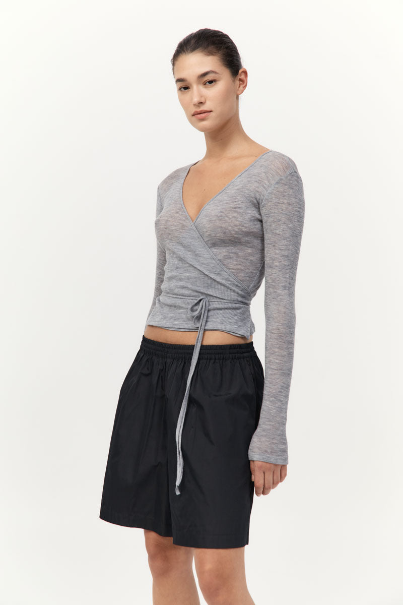 model wearing the St Agni baby wool wrap top