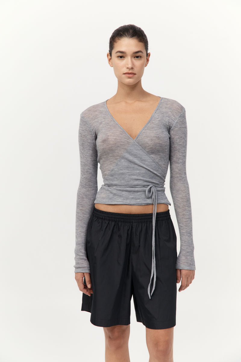 model wearing the St Agni baby wool wrap top