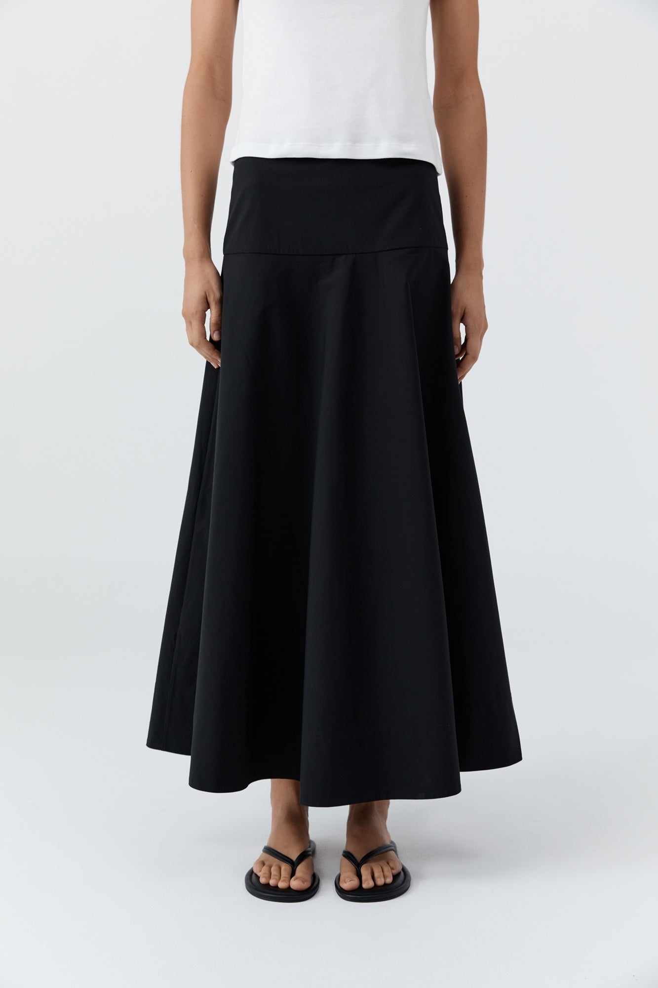 image of a model wearing the st agni circle cotton hem skirt