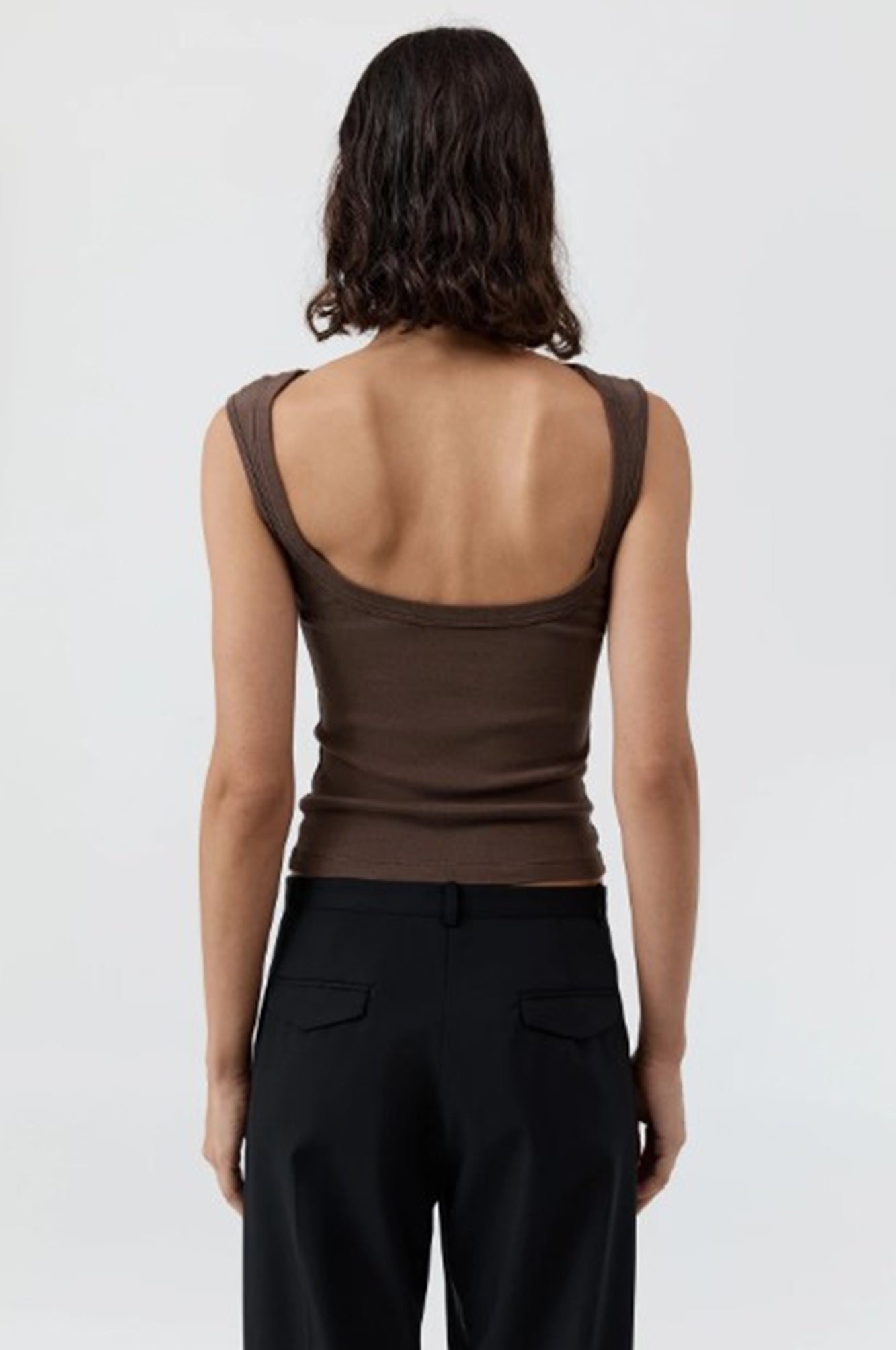 image of a woman wearing the st agni organic cotton ballerina top in fudge