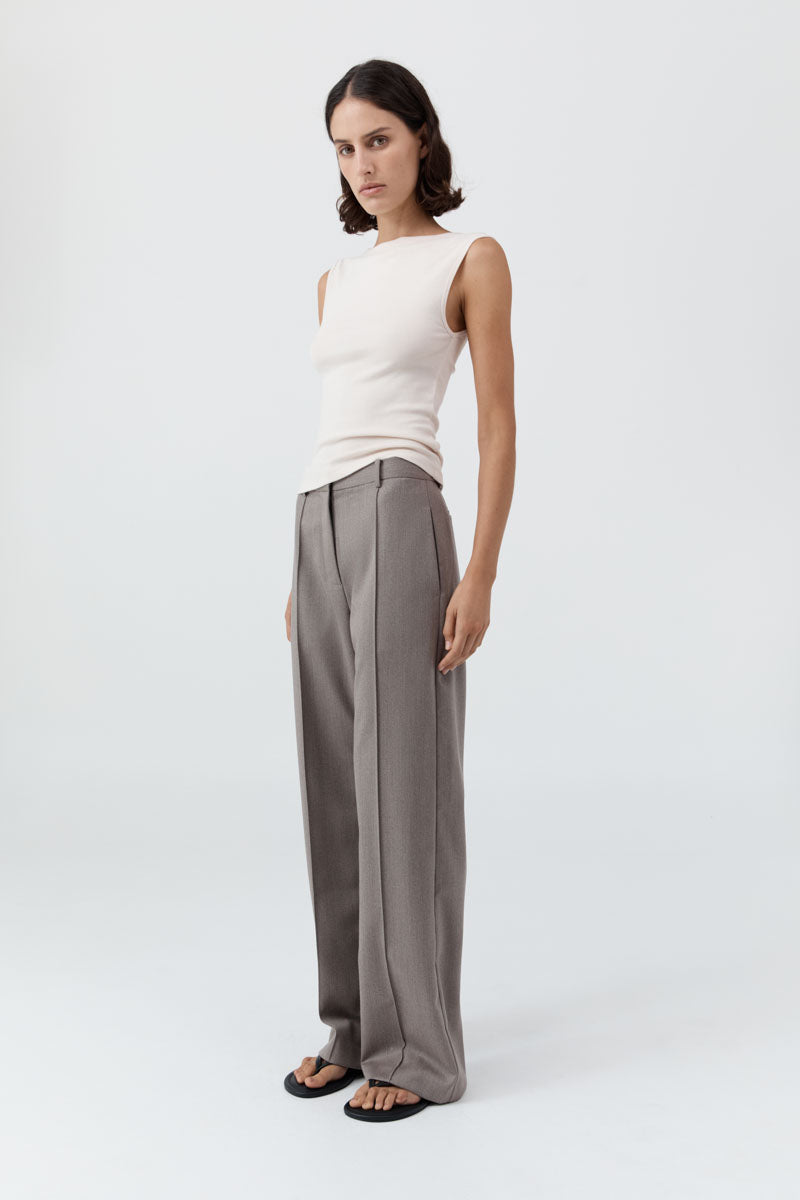 image of a model wearing the st agni organic cotton ballerina top in shell pink