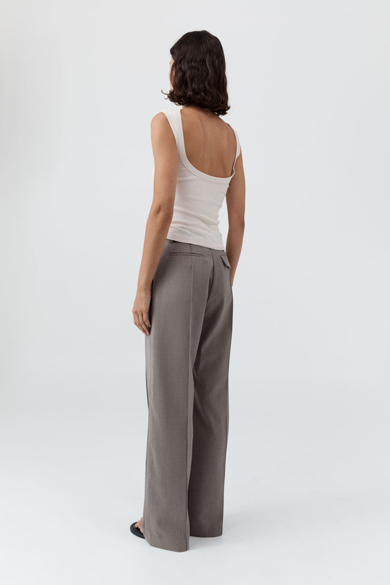 image of a woman wearing the st agni organic cotton ballerina top in shell pink