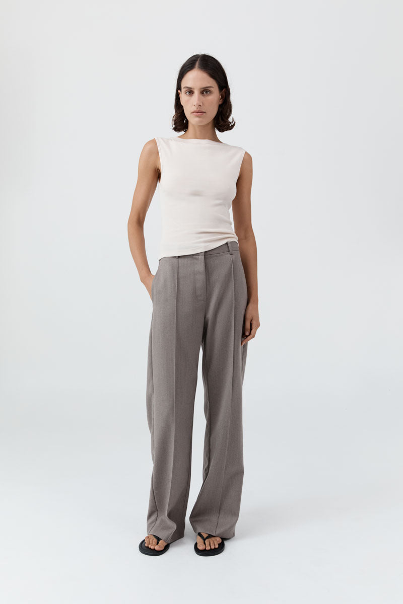 image of a woman wearing the st agni organic cotton ballerina top in shell pink