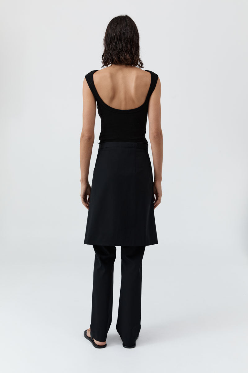 image of a woman wearing the st agni organic cotton ballet top in black