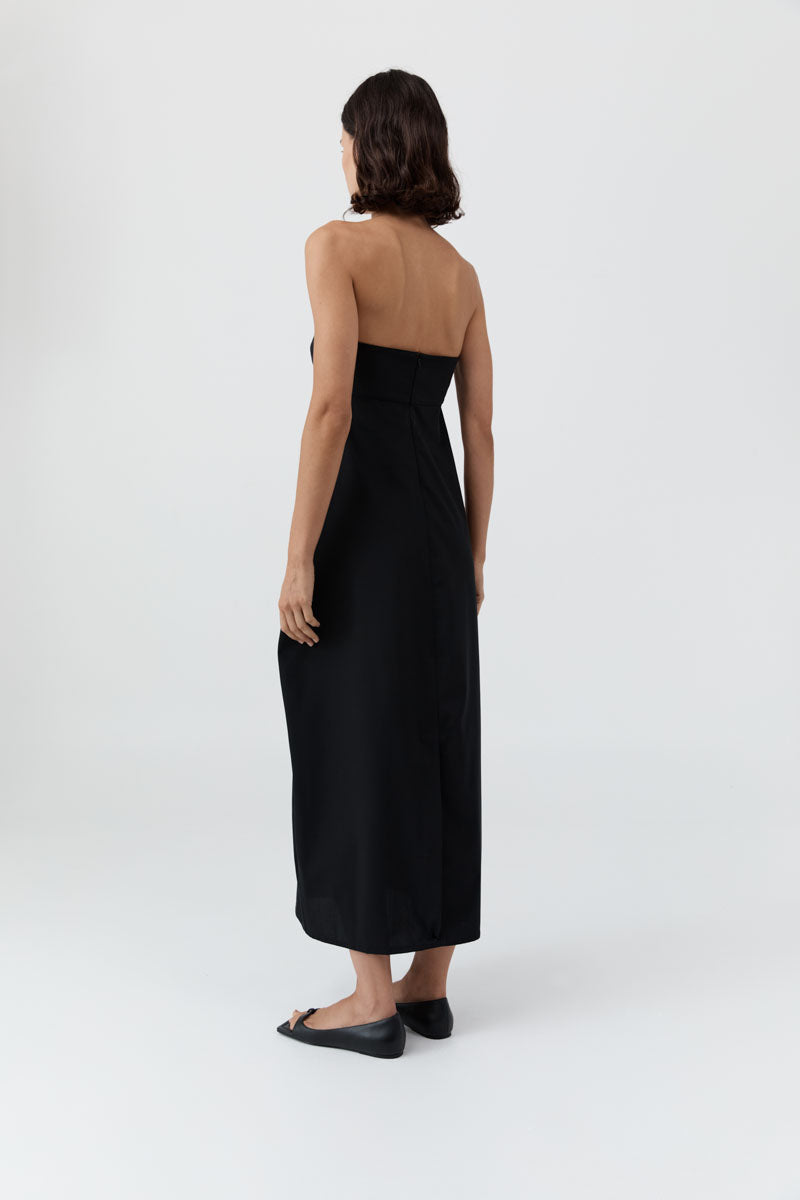 image of a model wearing the st agni wool cocoon strapless dress