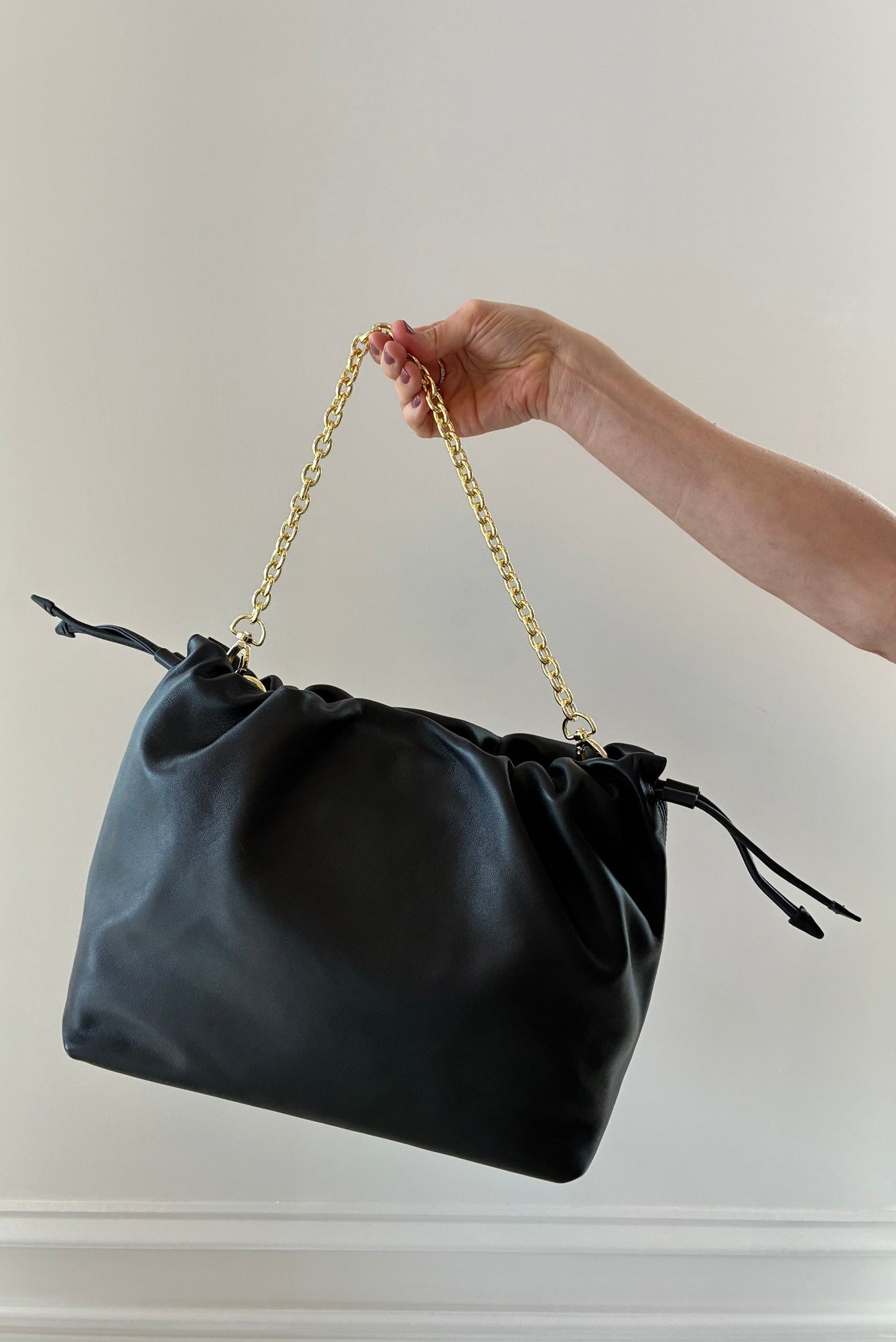 image of the Studio Amelia Alexandra Drawstring Bag in Black