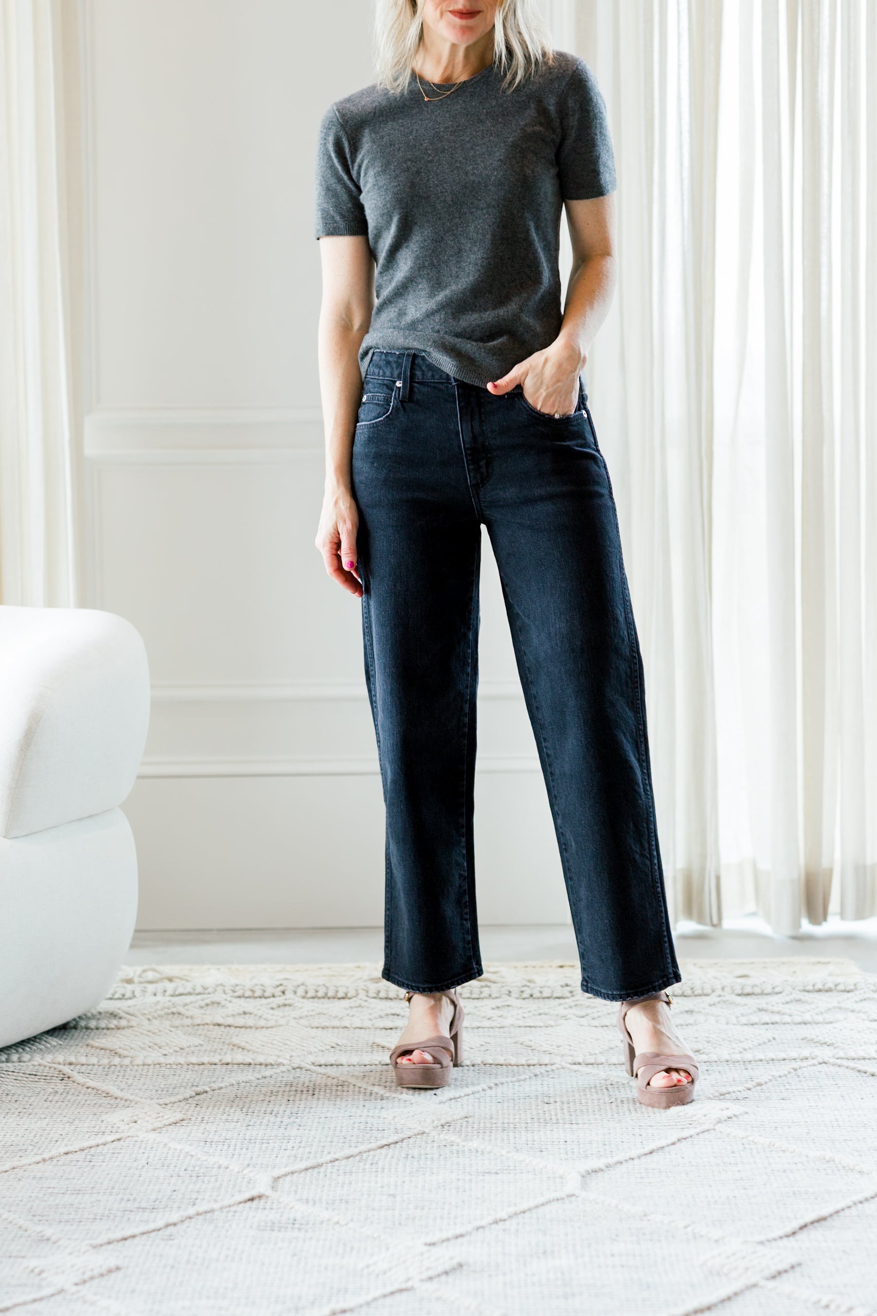 image of a woman wearing the garment como knit tee