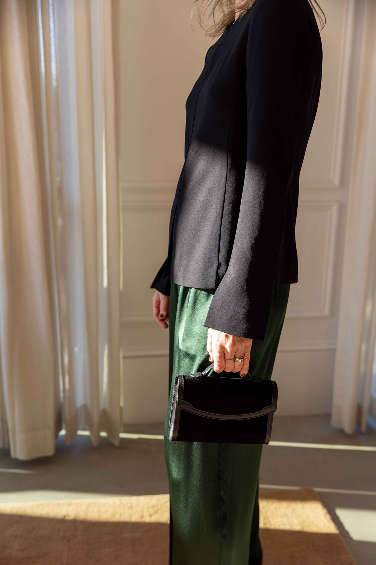 The Garment Crepe Slit Blouse in Black styled with Sablyn Brynn pants and a Hunting Season handbag, view 2