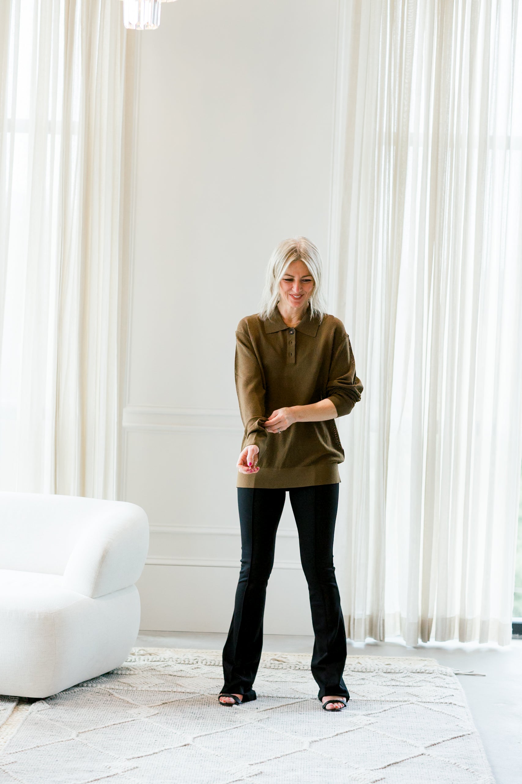 image of a woman wearing the garment madison man polo and chloe pants
