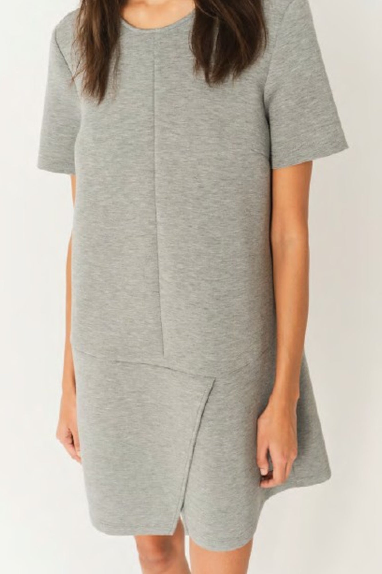Gray dress worn by a person on a white background