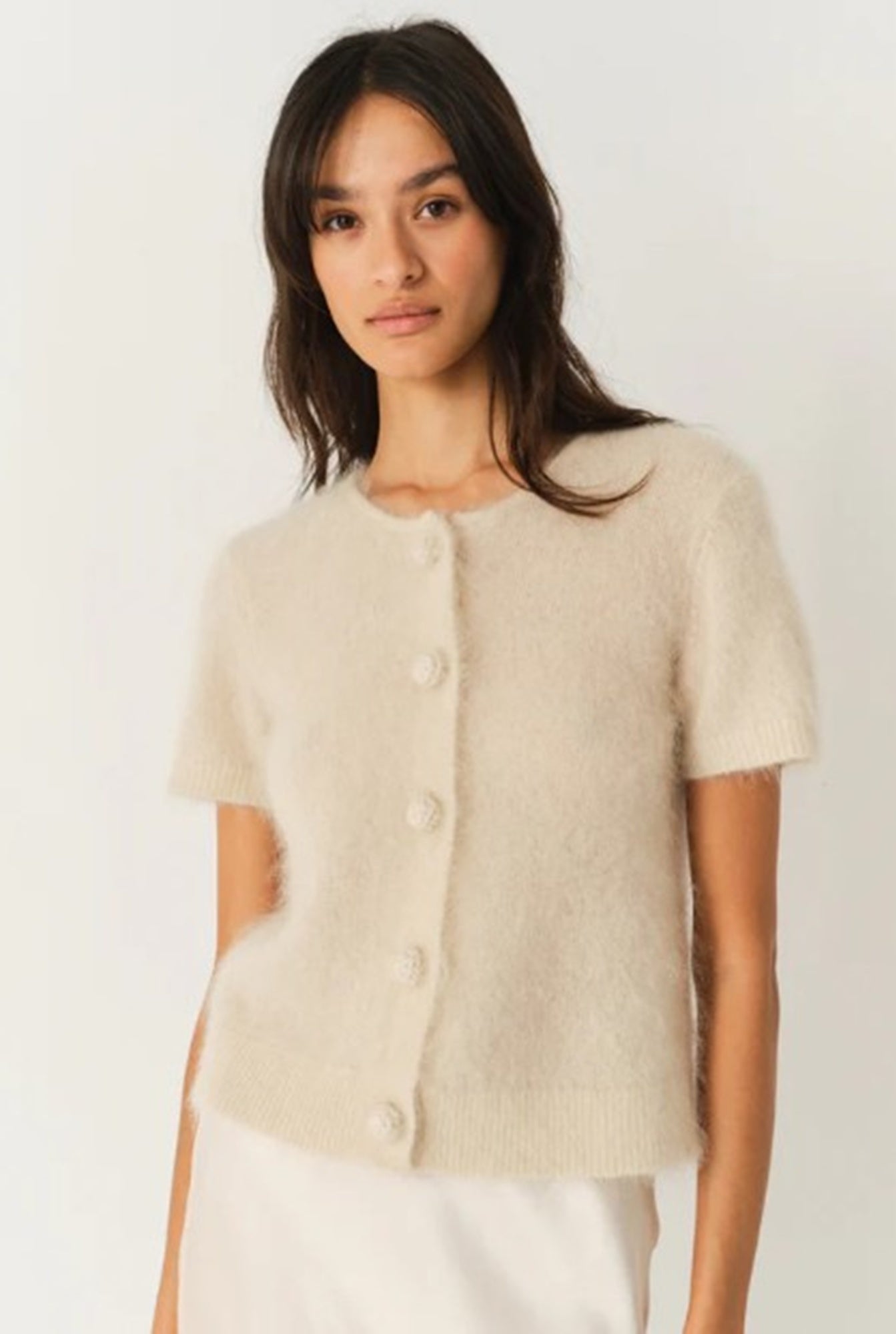 model wearing The Garment Roma Cardigan