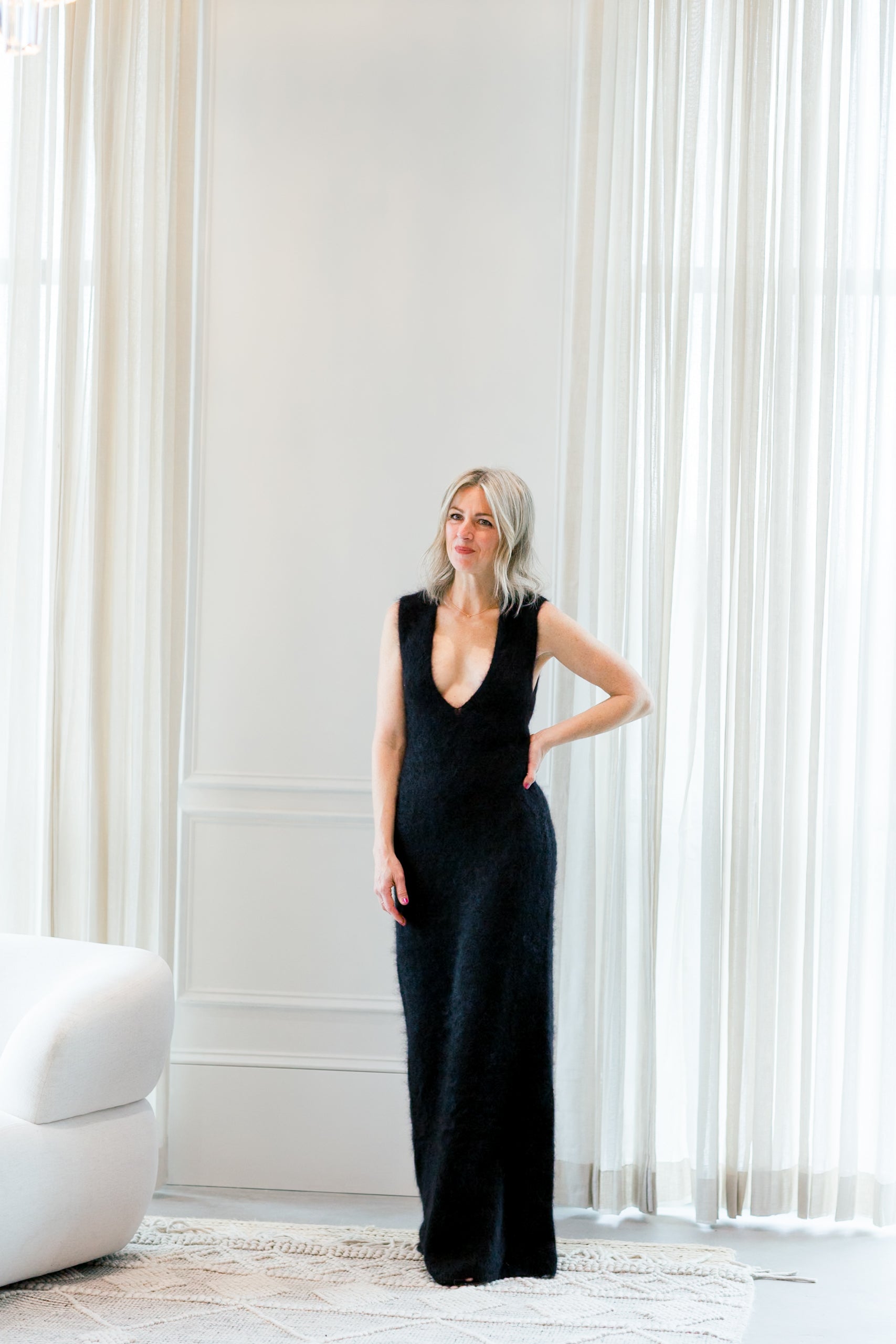 image of a woman wearing the garment roma gown