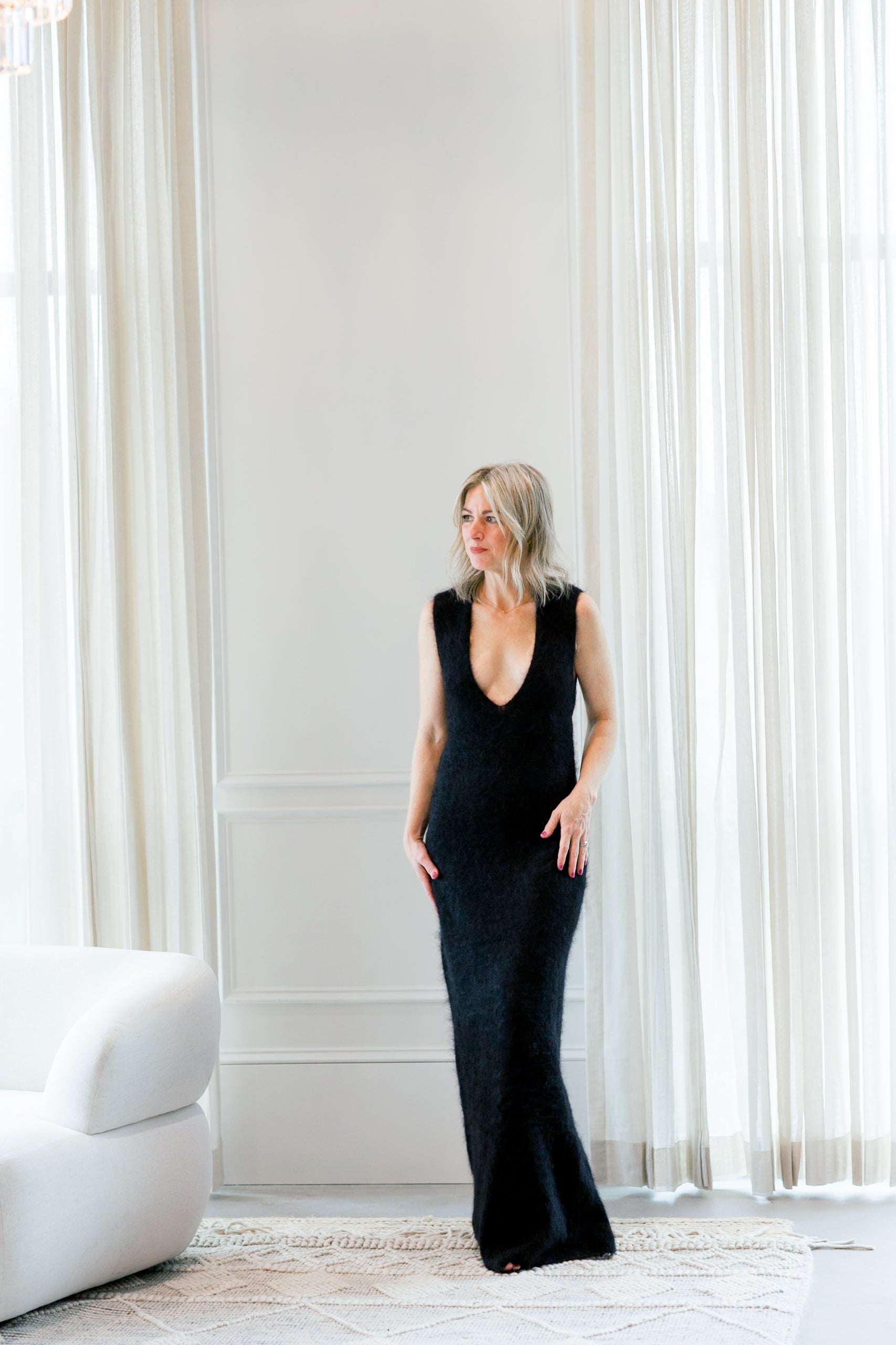 image of a woman wearing the garment roma gown