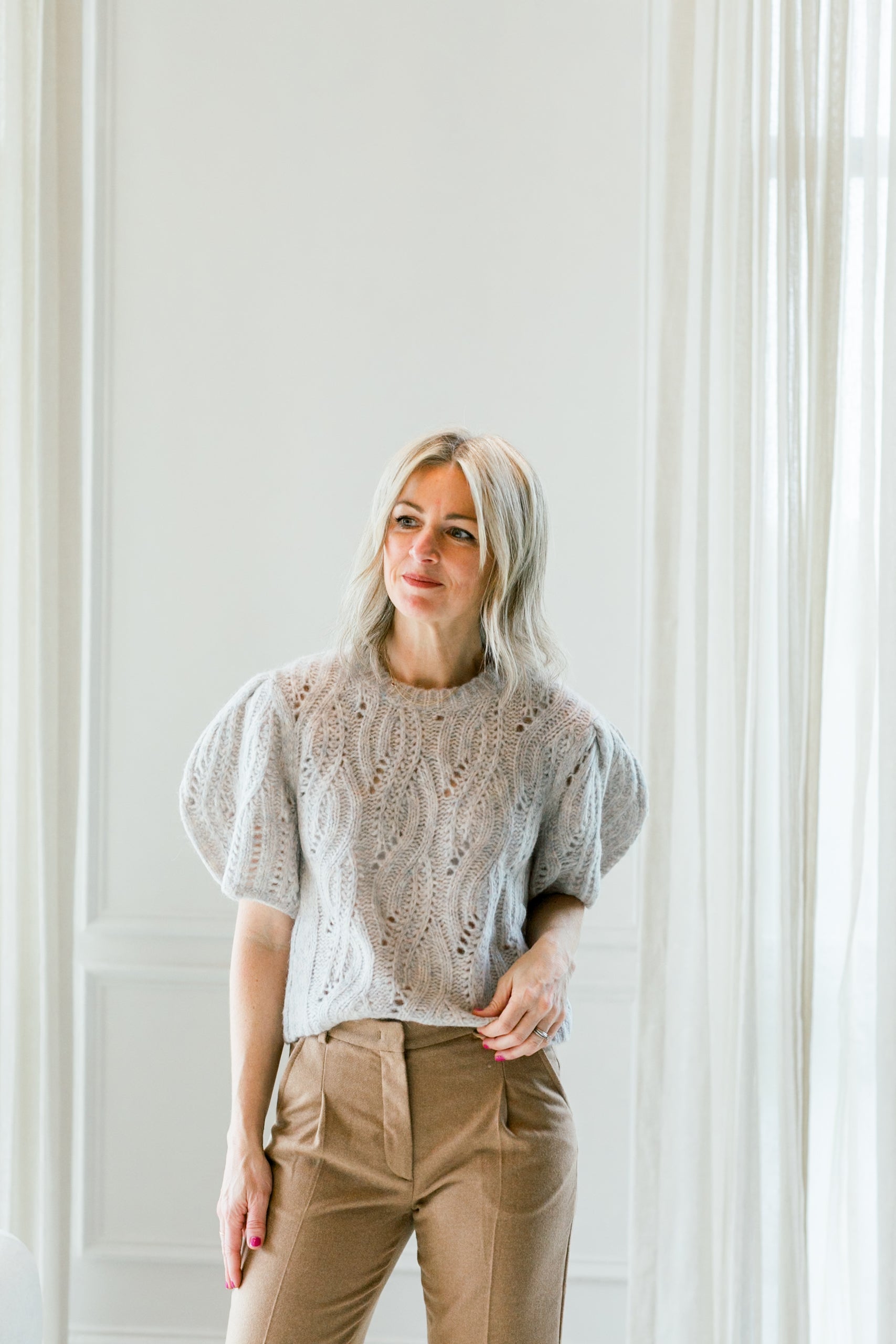 image of a woman wearing the garment valentina sweater